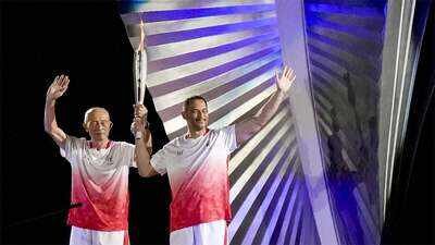 Father-son duo makes history: Five-time Asian Games champion Shigenobu Murofushi and Olympic gold medallist son Koji light cauldron in Aichi-Nagoya | Asian Games 2026 News