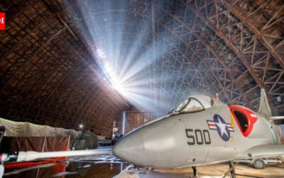 An 83-year-old Oregon blimp hangar was sold for $1 after a storm tore a 200-foot hole in its roof; after nearly 10 months shut, the air museum inside is now set to reopen on October 29