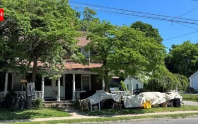 A Connecticut town paid $455,000 for a historic two-family home to create about 20 library parking spaces; a state preservation council has now voted to ask the attorney general to stop its demolition