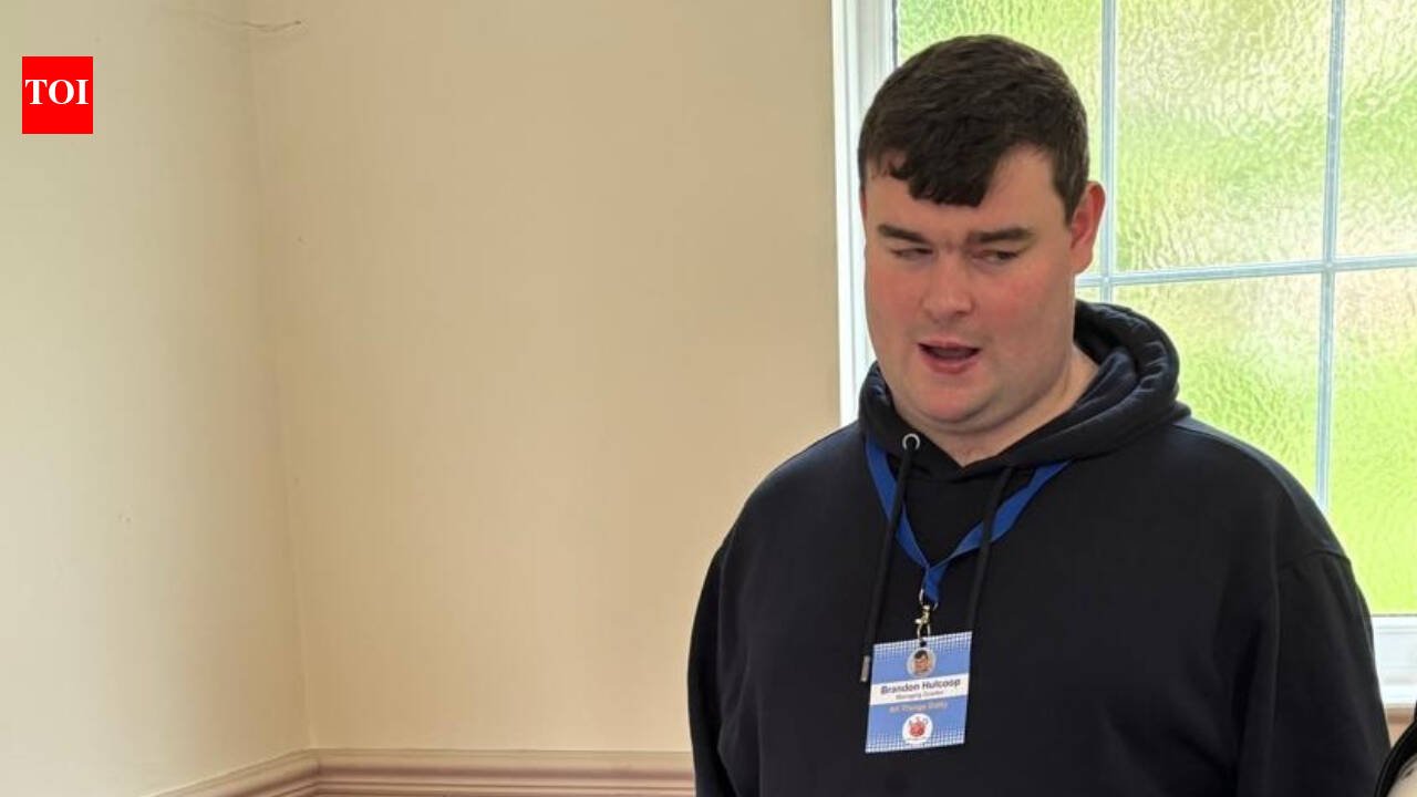 A blind UK man applied for more than 1,000 jobs without success and spent 16 months unemployed, then built an accessibility business; at 23, Brandon Hulcoop has won the King’s Trust Young Achiever award