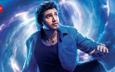 ‘Athisaya Piravi’ first look out: Santhanam’s comedy sci-fi film borrows Rajinikanth’s 1990 title | Tamil Movie News