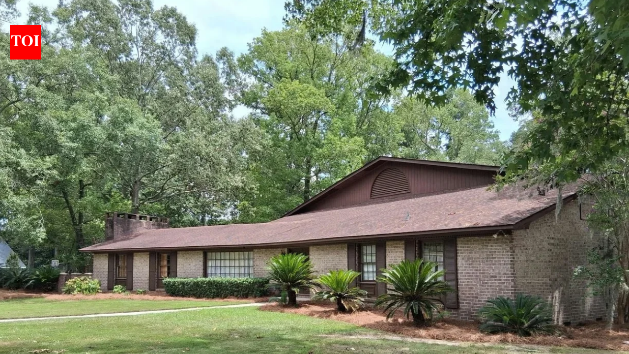 A South Carolina ranch house built in 1958 grew into a 5,390-square-foot retreat with three kitchens and an indoor pool under a 31-foot ceiling; 68 years later, the unusual 1.21-acre home is listed for $1.227 million