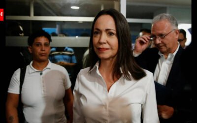 ‘I am here. With you’: Maria Corina Machado returns to Venezuela from exile