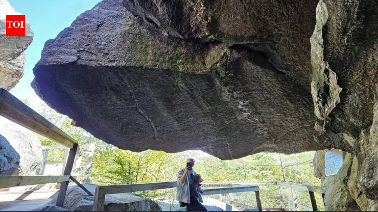 An 80-ton boulder that had hung above visitors at New Hampshire’s Polar Caves since the park opened in 1922 collapsed on the final day of the 2026 season, smashing a walkway but injuring no one